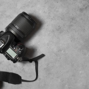 top-view-photo-camera-indoors-still-life